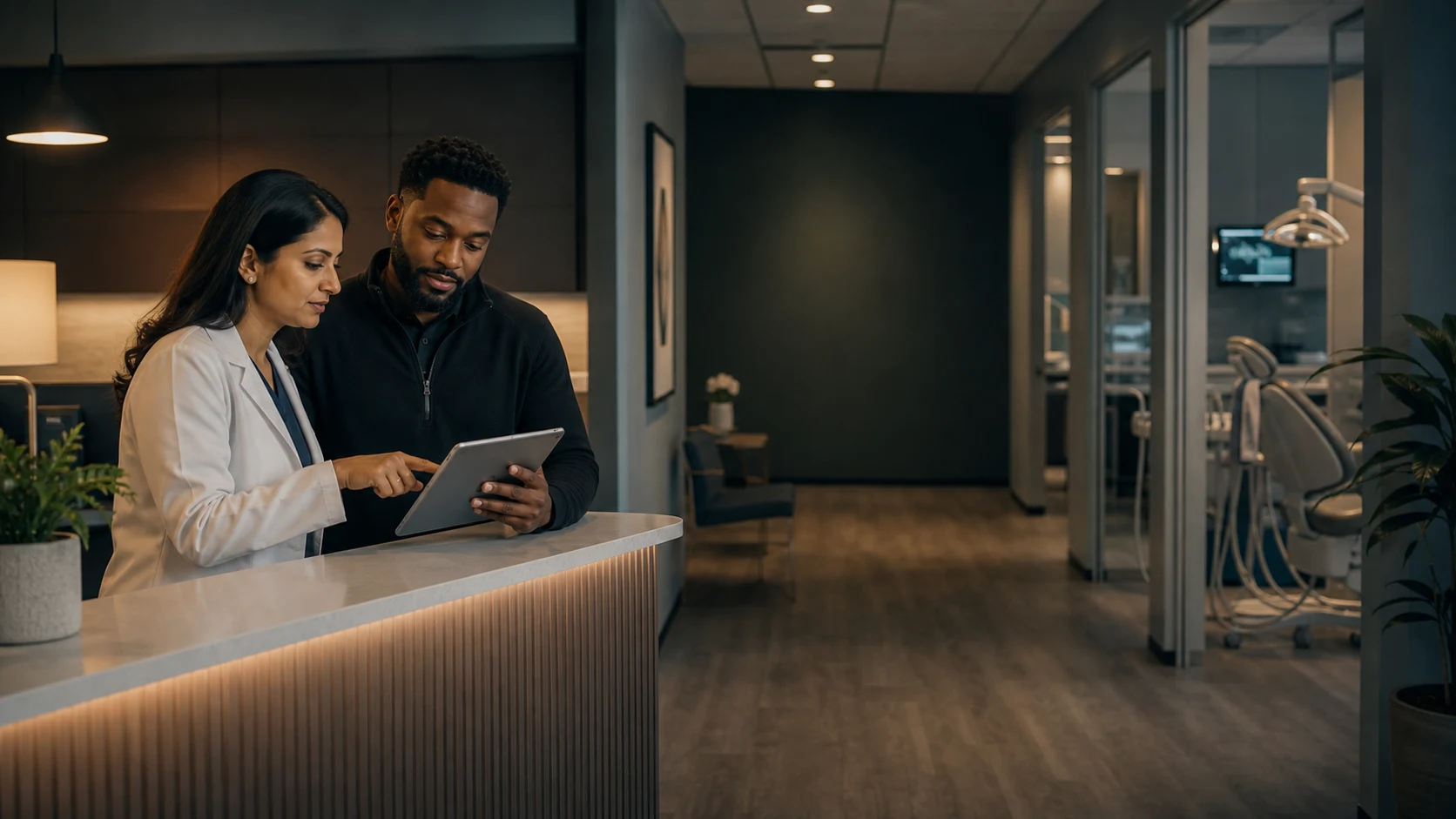 Healthcare practice owner reviewing financial priorities with an office manager.
